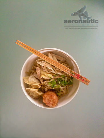 Food Stock Photo - Bowl of Noodles with Chopsticks - Download Now!