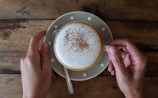 Coffee Stock Photo - Hands Holding a Cup of Cappuccino